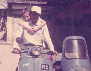 sudhir vakharia with her daughter on the delivery vehicle